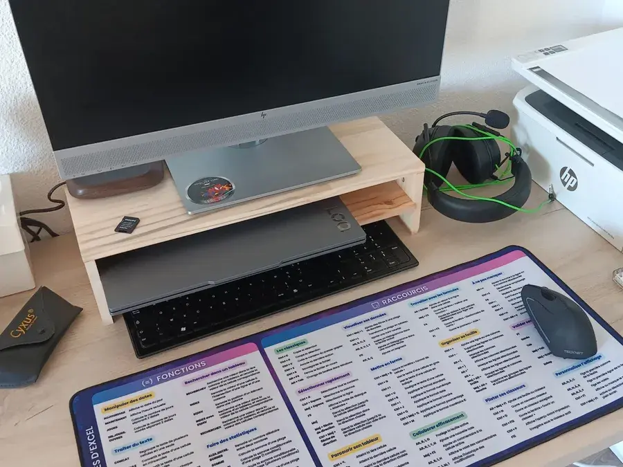 Le tapis de souris Excel sur le bureau de Jérémy